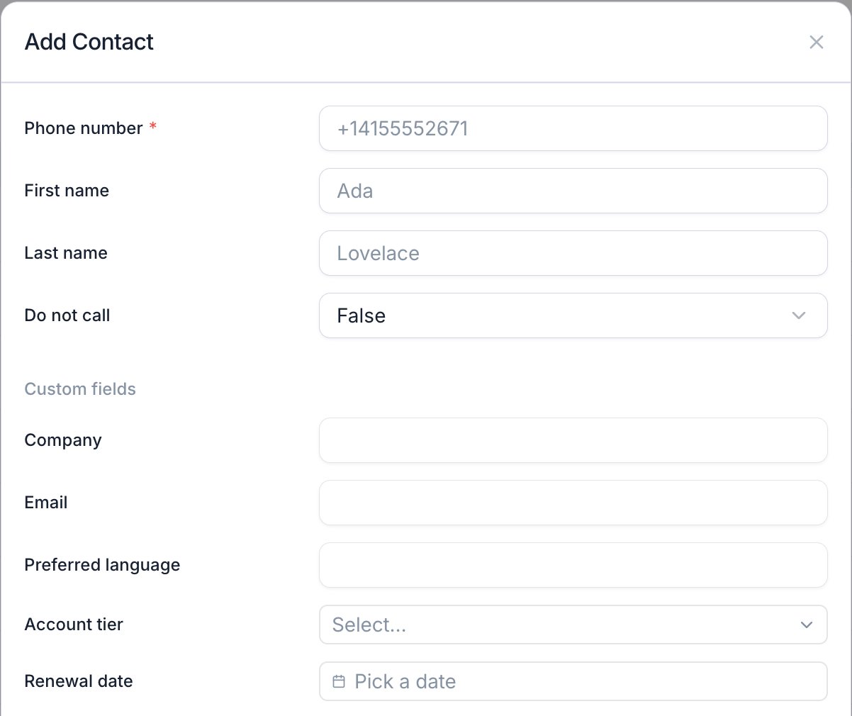 Add Contact dialog with a required phone number field showing the placeholder +14155552671, first name, last name, a Do not call dropdown set to False, and a Custom fields section listing the workspace's own fields: Company, Email, Preferred language, an Account tier selector, and a Renewal date picker.