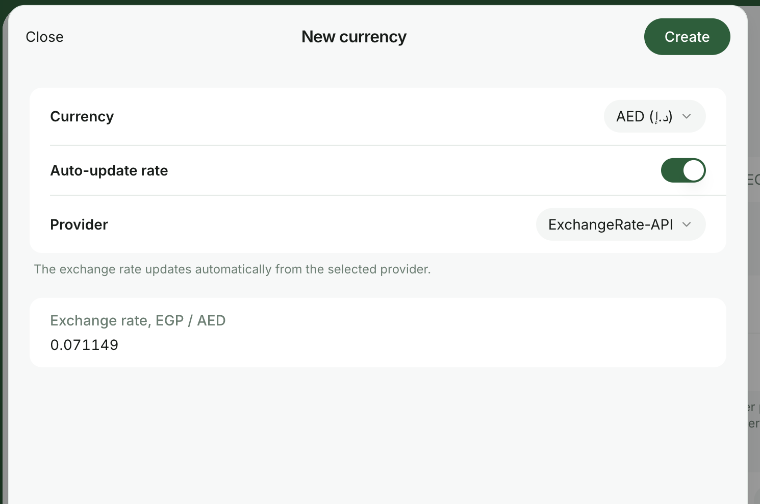 Configure automatic exchange-rate updates for a currency in RNTOR
