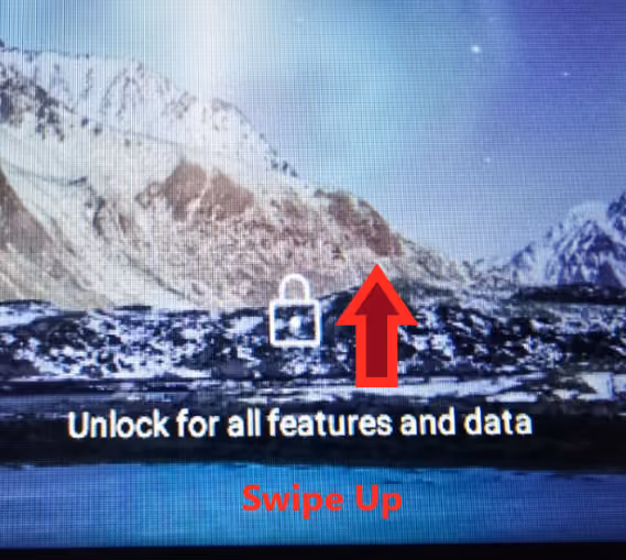 Lock screen with an arrow showing where to swipe up from the padlock