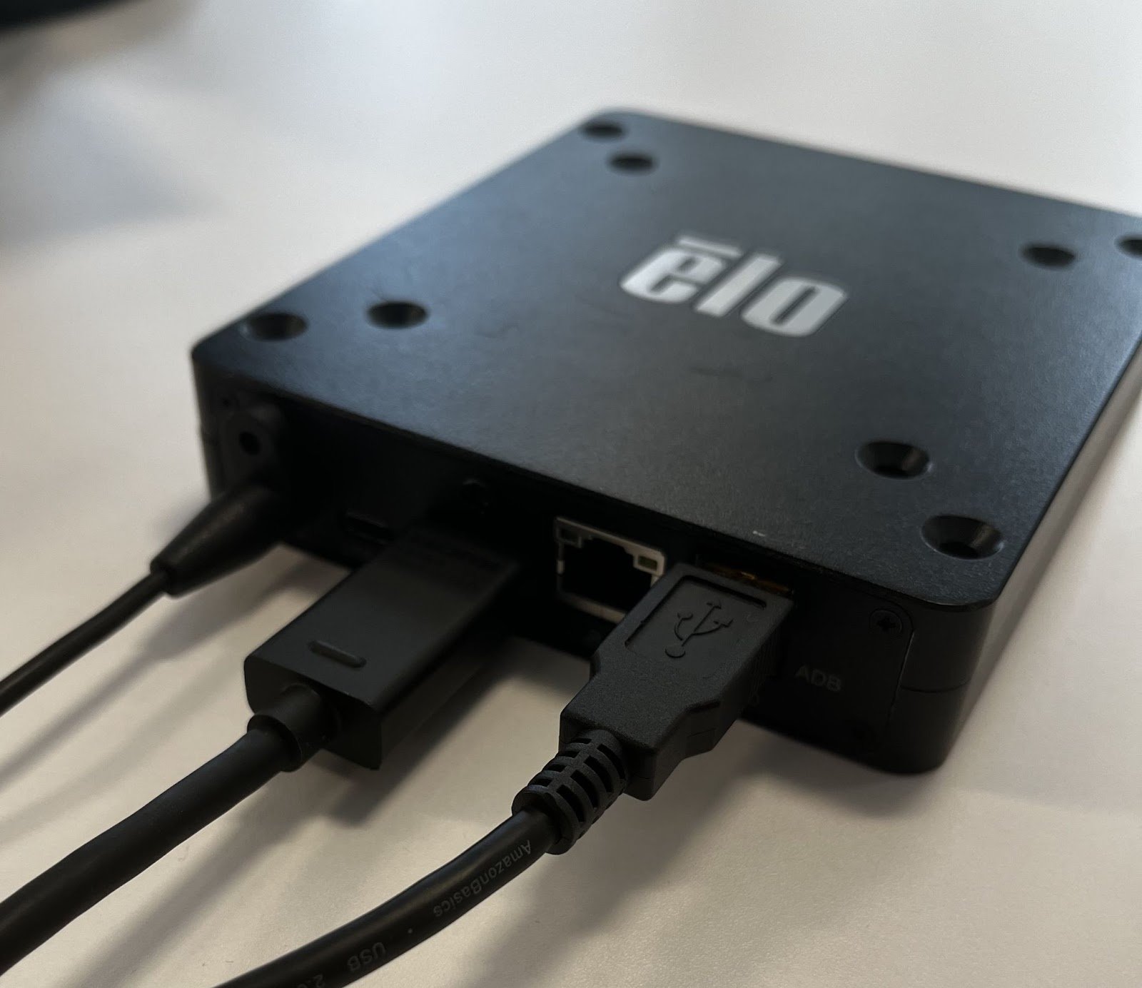 Elo Backpack connected to HDMI and USB cables