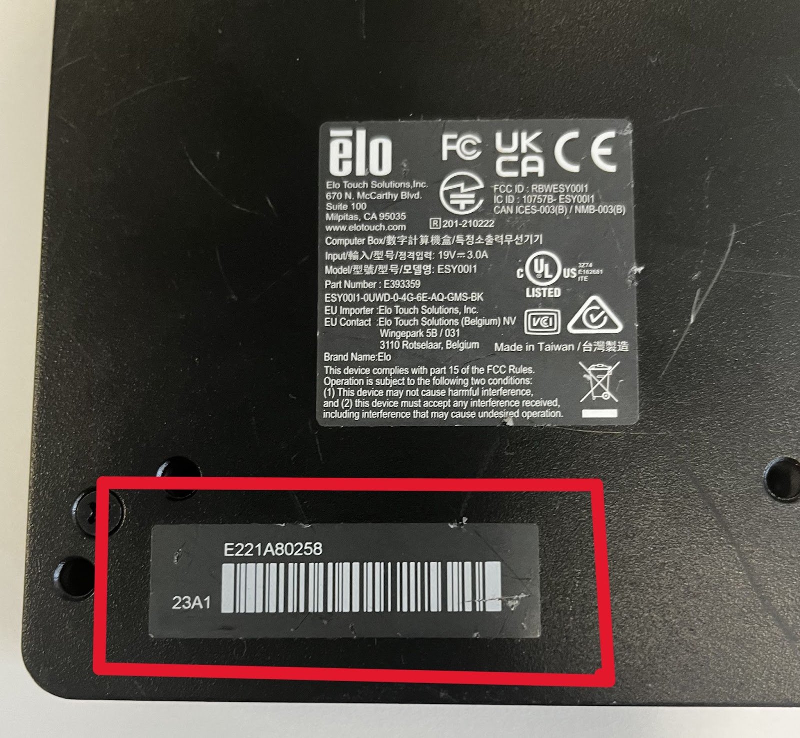 Serial number label on the back of an Elo Backpack, outlined in red