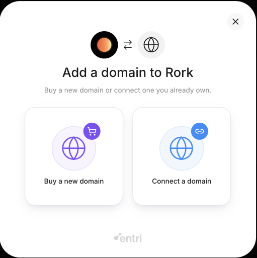 The Entri dialog titled Add a domain to Rork, offering Buy a new domain and Connect a domain