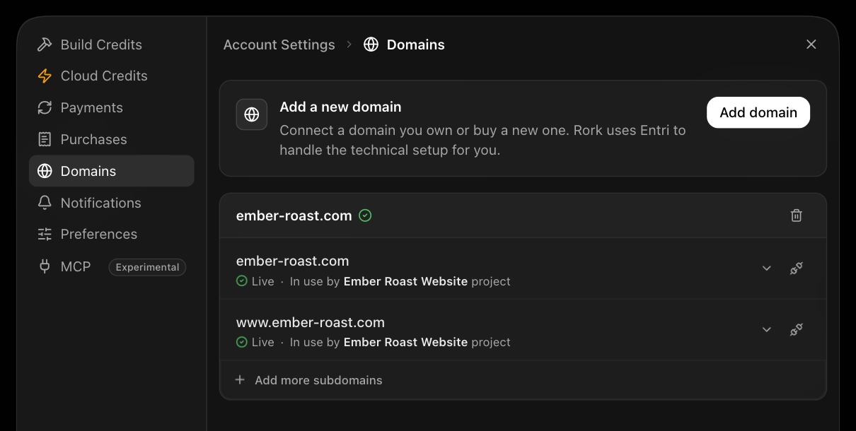 The Domains tab of Rork account settings, showing the Add a new domain card and a connected domain with two addresses marked Live and In use by a project