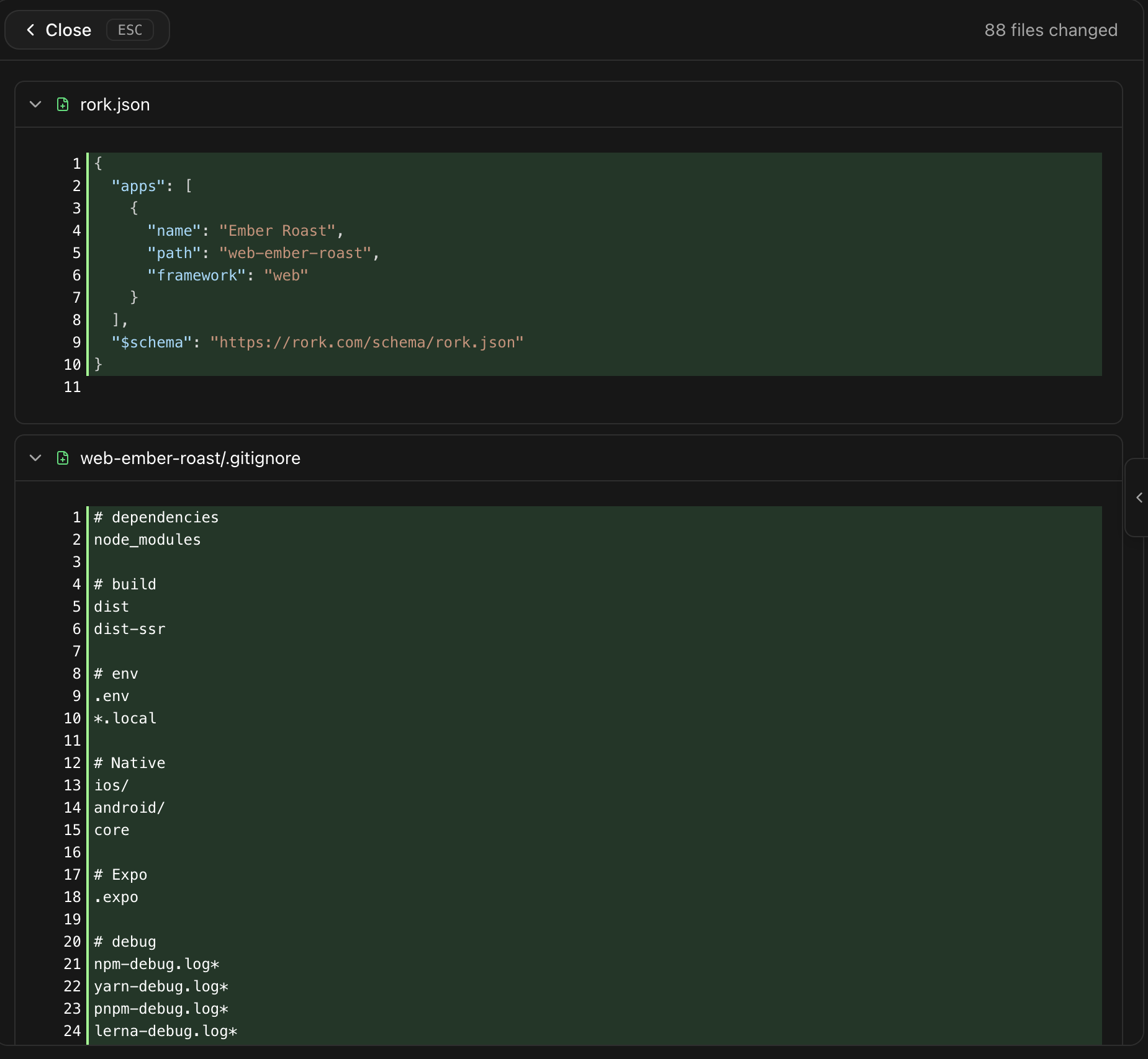 The Rork diff view showing rork.json and gitignore with added lines highlighted in green, and 88 files changed in the header