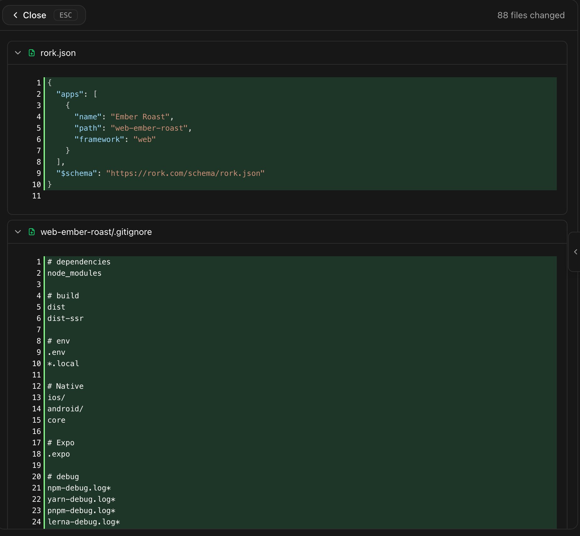 The Rork diff view showing rork.json and gitignore with added lines highlighted in green, and 88 files changed in the header