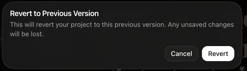 A dialog titled Revert to Previous Version warning that unsaved changes will be lost, with Cancel and Revert buttons