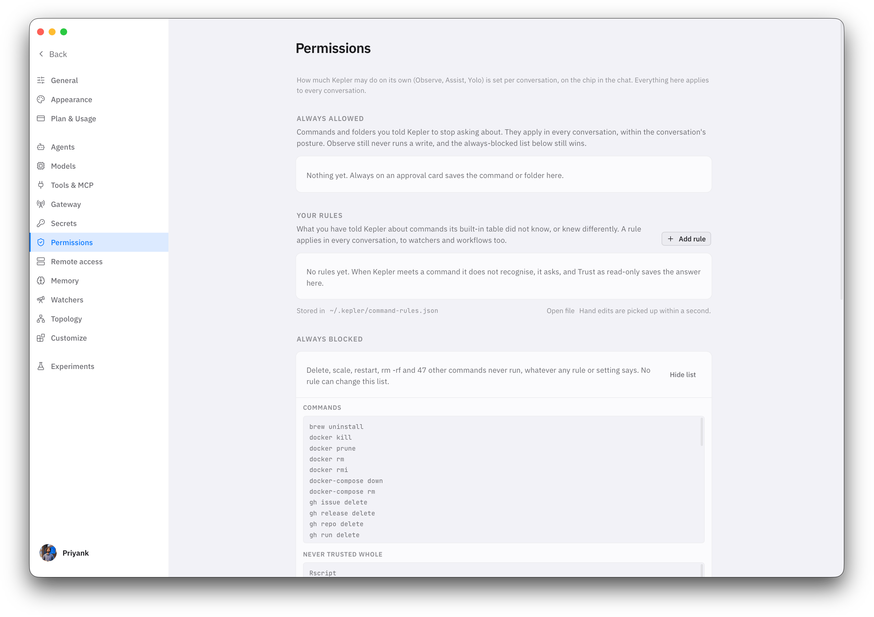 The Permissions settings page on a fresh profile. Always allowed and Your rules are both empty with a note on what fills them, the rules file path is shown, and the Always blocked list is expanded to show the first of its commands and the start of the Never trusted whole list.