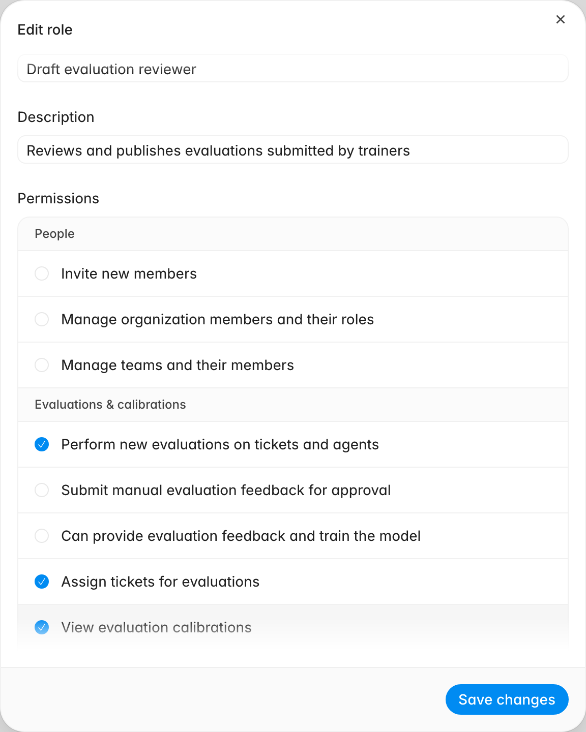 Edit role dialog for a custom role with a newly checked permission and the Save changes button enabled