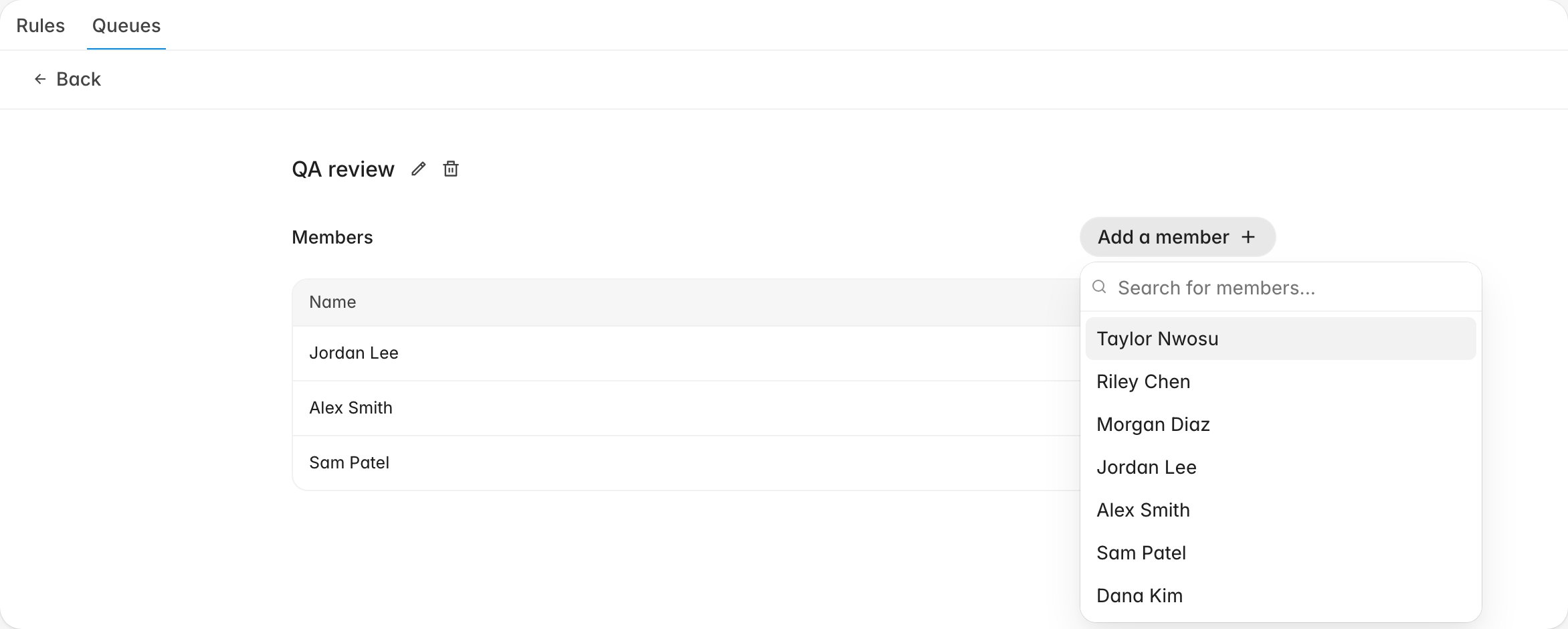 Add a member popover open over the queue members table showing the searchable list of organization members