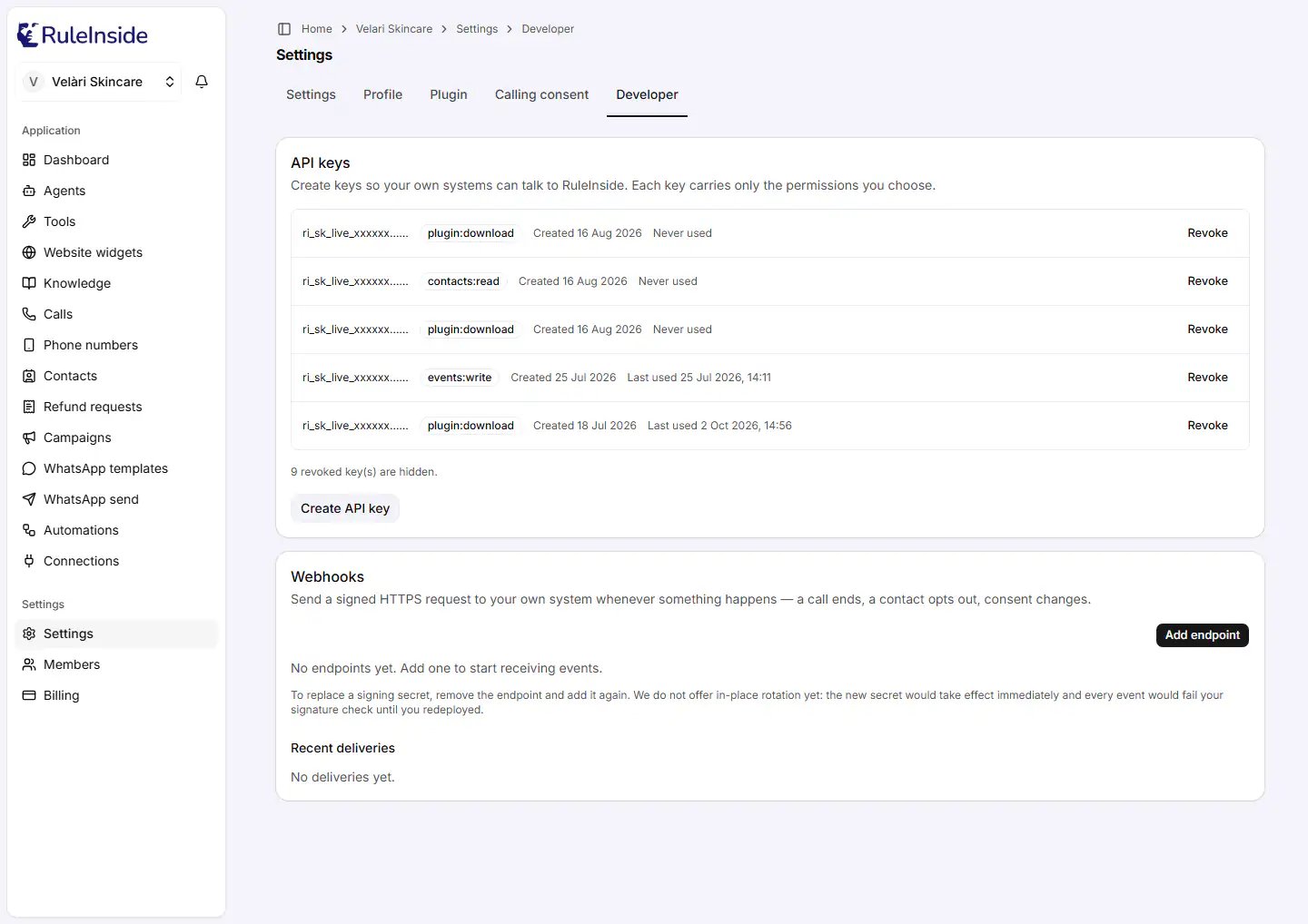 The Developer tab in Settings, with the API keys card and the Webhooks card