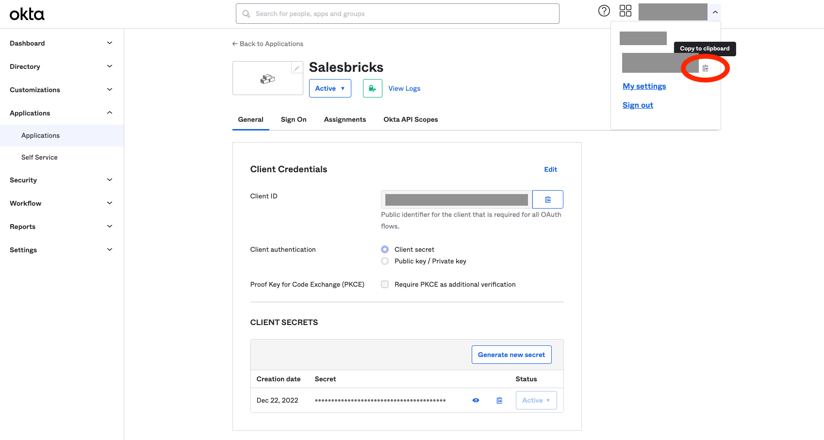 An image of the Okta admin dashboard. There is a red oval around the clipboard icon that copies the issuer URL to the clipboard.