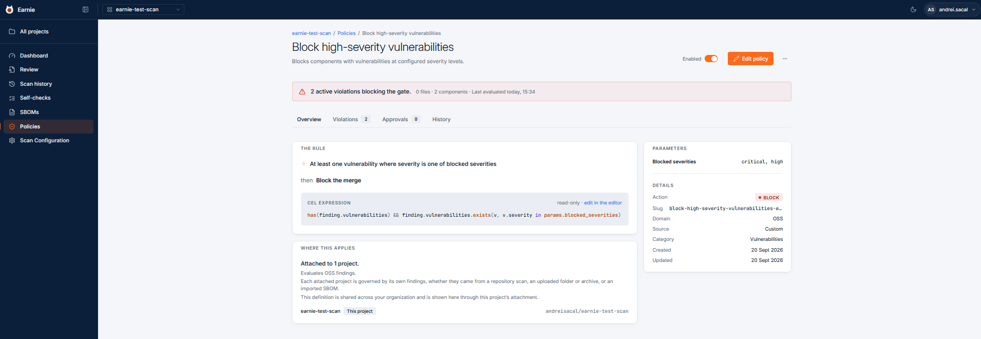 Policy detail view with Overview, Violations, Approvals, and History tabs