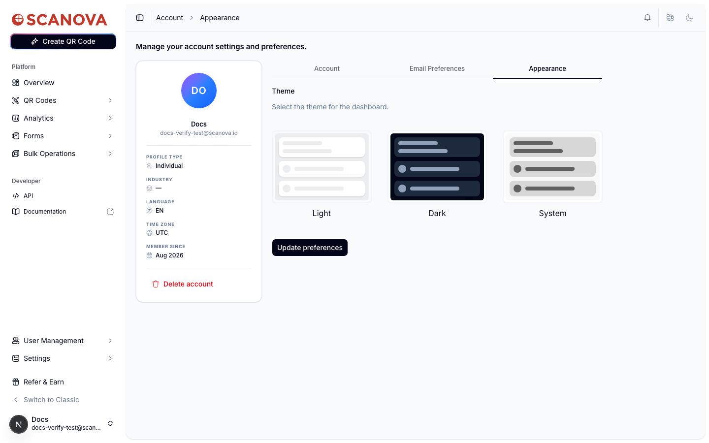 Appearance tab showing a Theme section with three selectable preview cards: Light, Dark, and System, and an Update preferences button