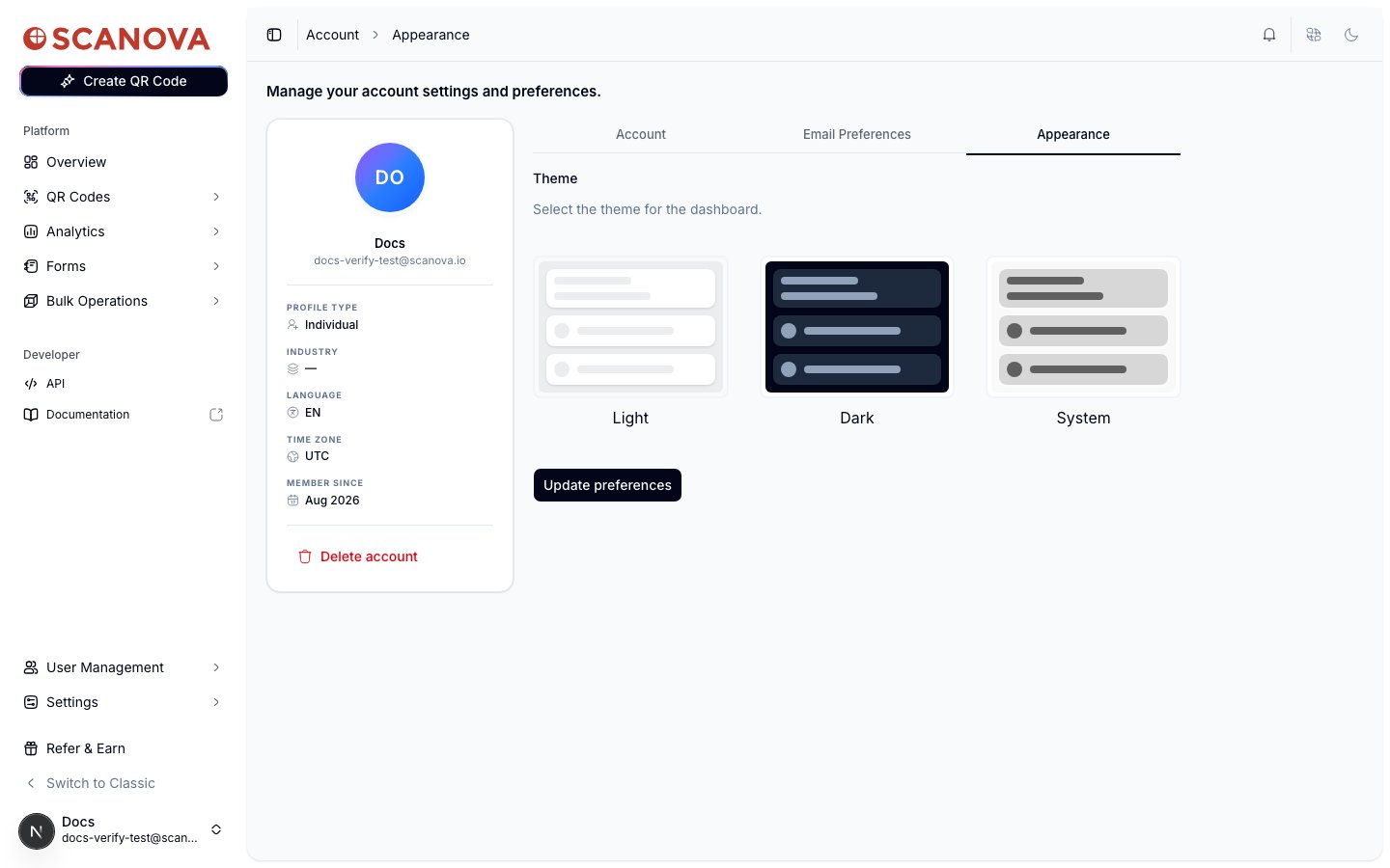 Appearance tab showing a Theme section with three selectable preview cards: Light, Dark, and System, and an Update preferences button