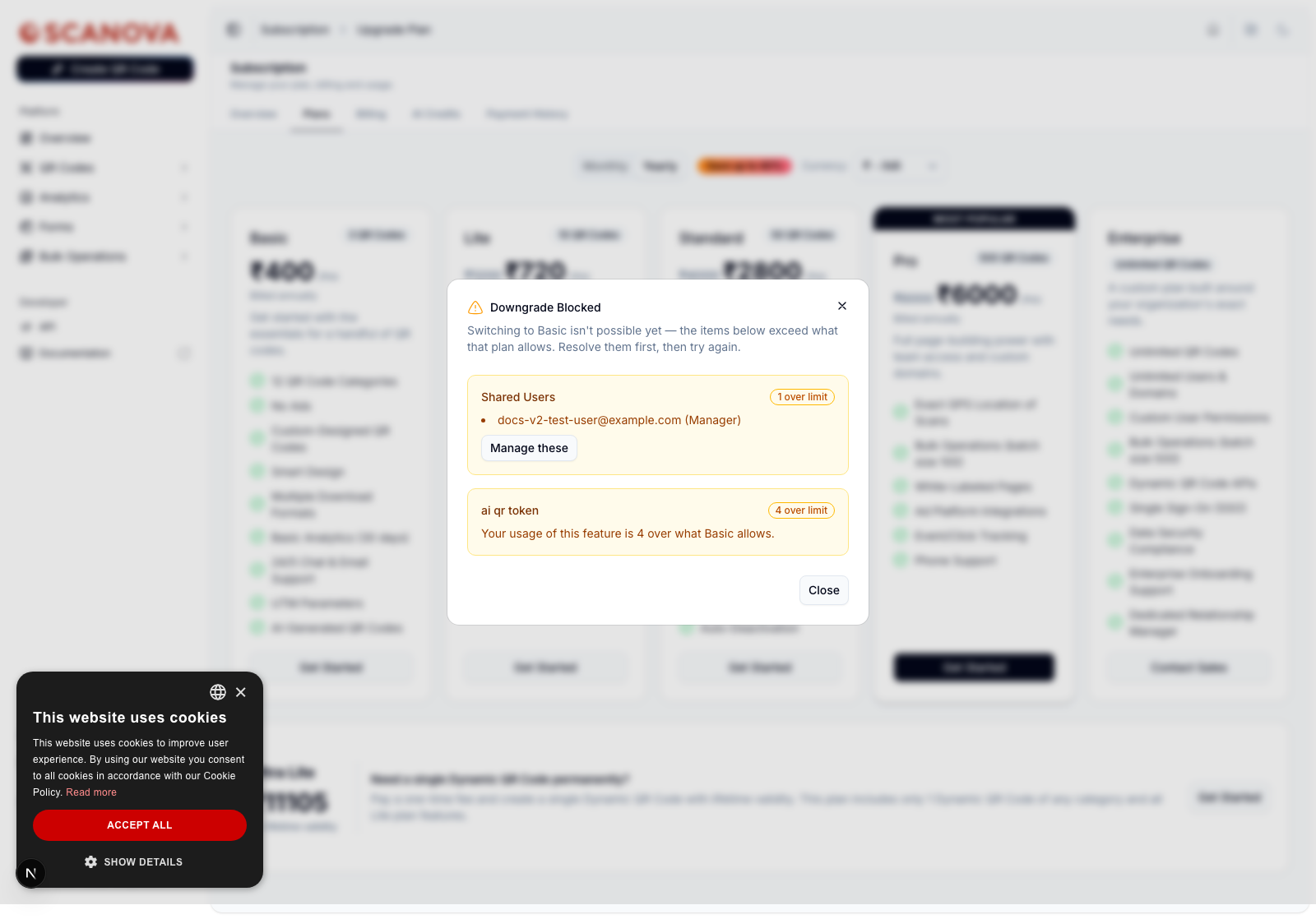 Downgrade Blocked dialog stating that switching to Basic isn't possible because usage exceeds plan limits, listing Shared Users (1 over limit) with a Manage these button and ai qr token (4 over limit), with a Close button