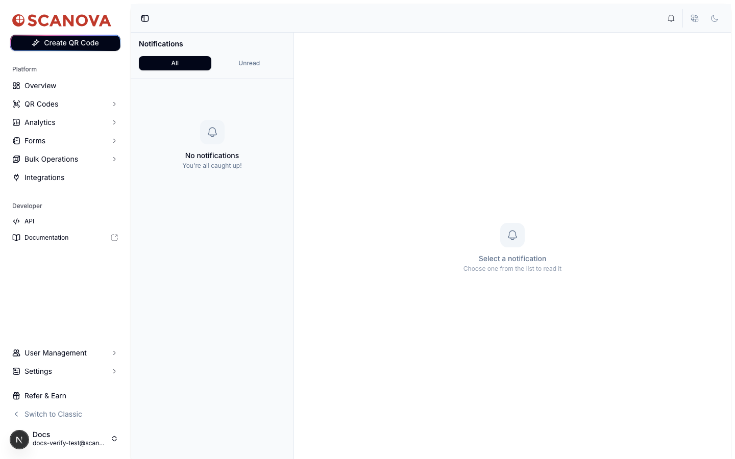 صفحة Notifications تعرض علامتي تبويب All وUnread، وقائمة إشعارات فارغة تقول 'No notifications — You're all caught up!'، ولوحة تفاصيل فارغة تقول 'Select a notification — Choose one from the list to read it'