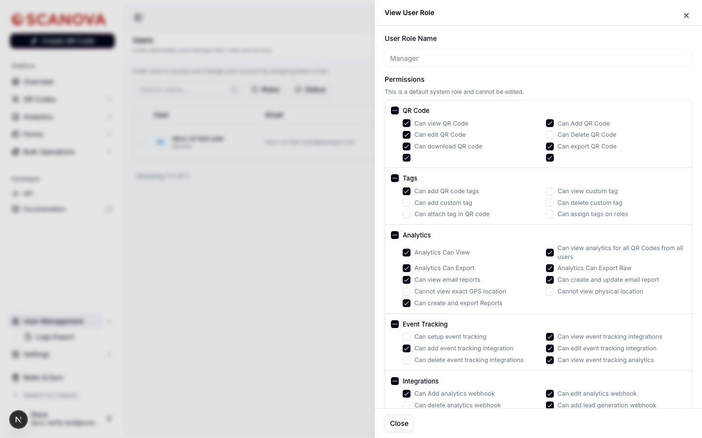 View User Role drawer for the Manager role, with a disabled User Role Name field and a Permissions section reading 'This is a default system role and cannot be edited,' followed by checkbox groups for QR Code, Tags, Analytics, Event Tracking, and Integrations
