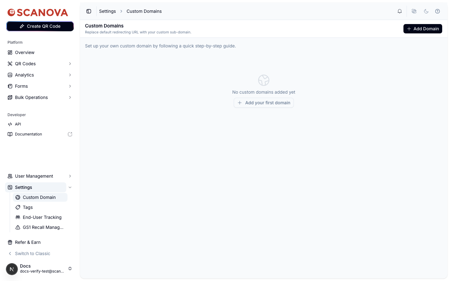 Custom Domains settings page showing an empty state with a globe icon, 'No custom domains added yet', and an Add Domain button