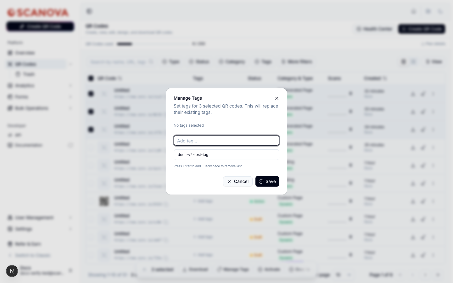 مربع حوار Manage Tags مفتوح لثلاثة رموز QR محددة، يعرض النص 'Set tags for 3 selected QR codes. This will replace their existing tags.'
