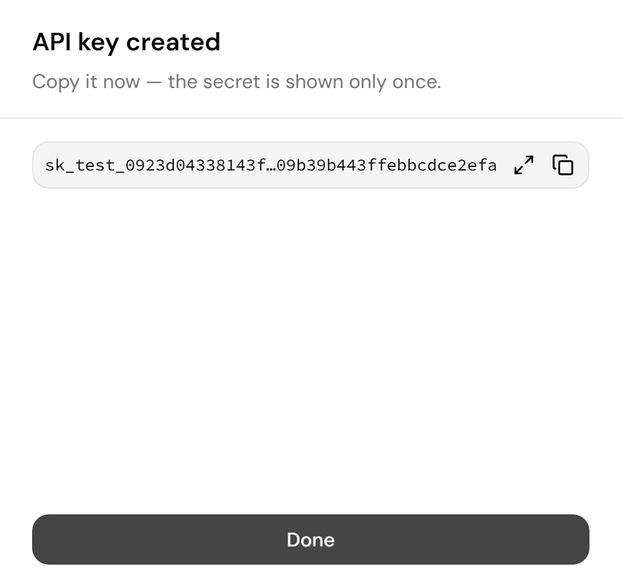 Screenshot of the API key created drawer, with the full secret key in a copy field and the Done button