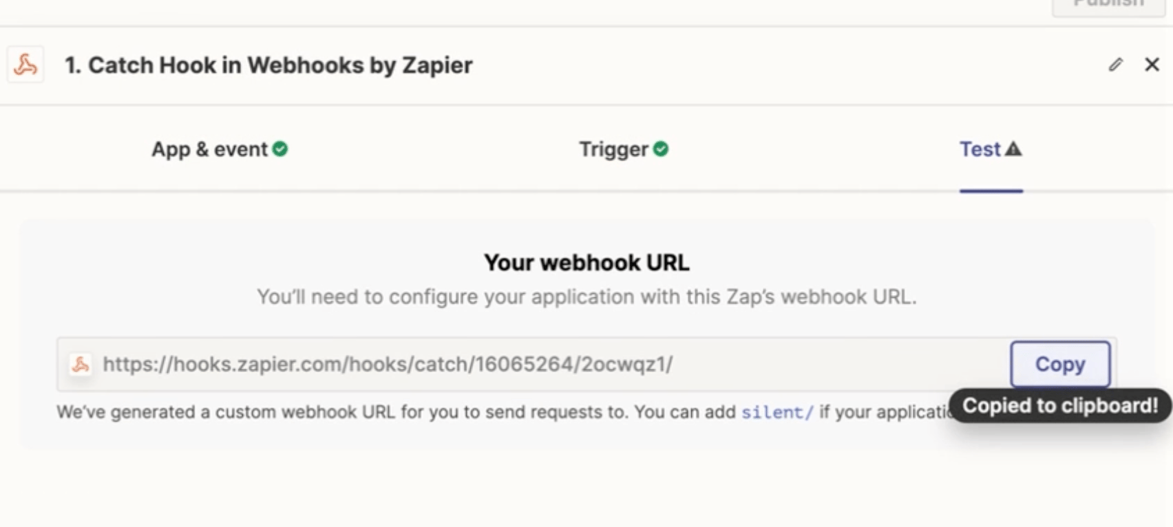 Zapier Catch Hook trigger setup page with generated webhook URL