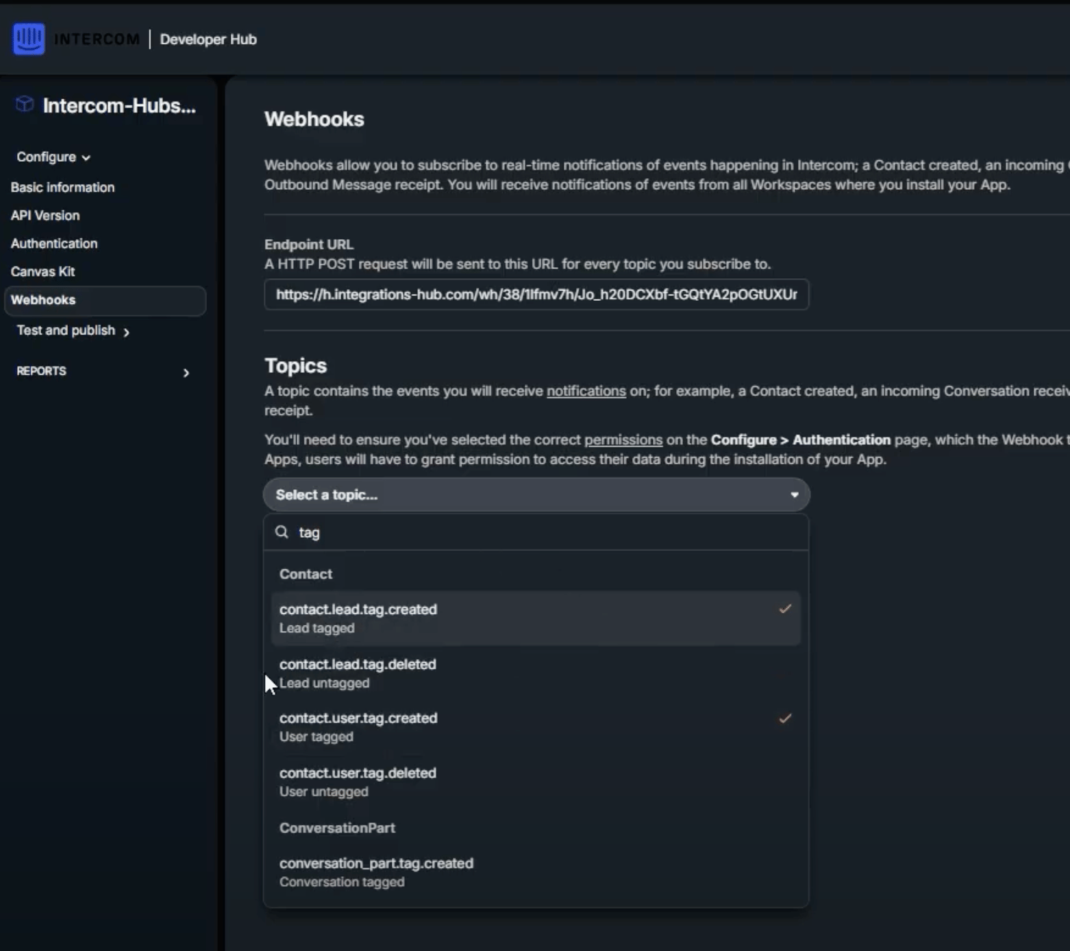 Intercom Settings page showing Developers menu and Webhooks configuration option