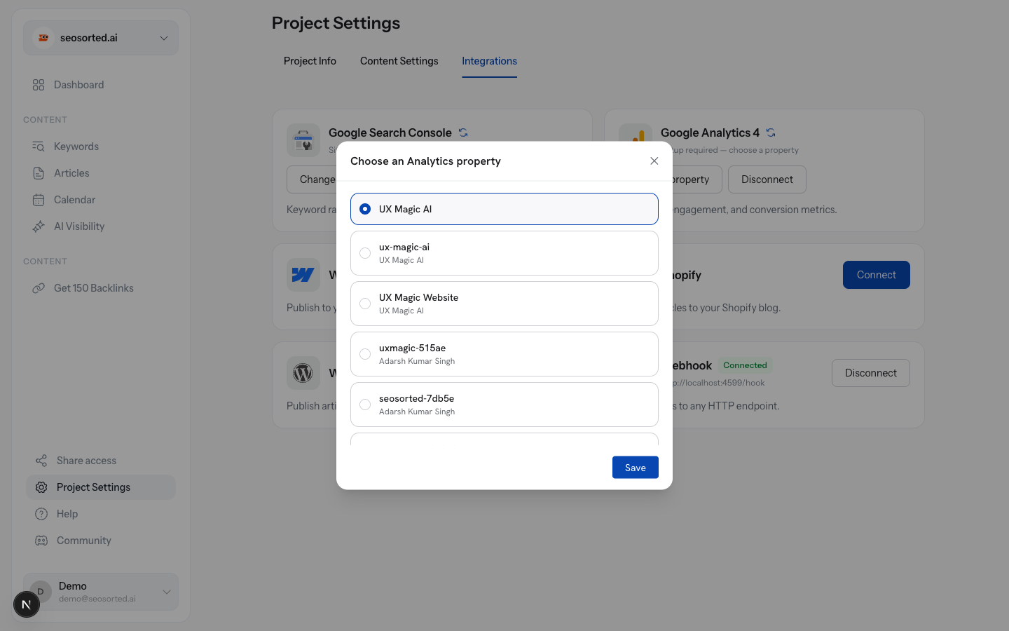 Choose an Analytics property dialog opened from the Integrations tab