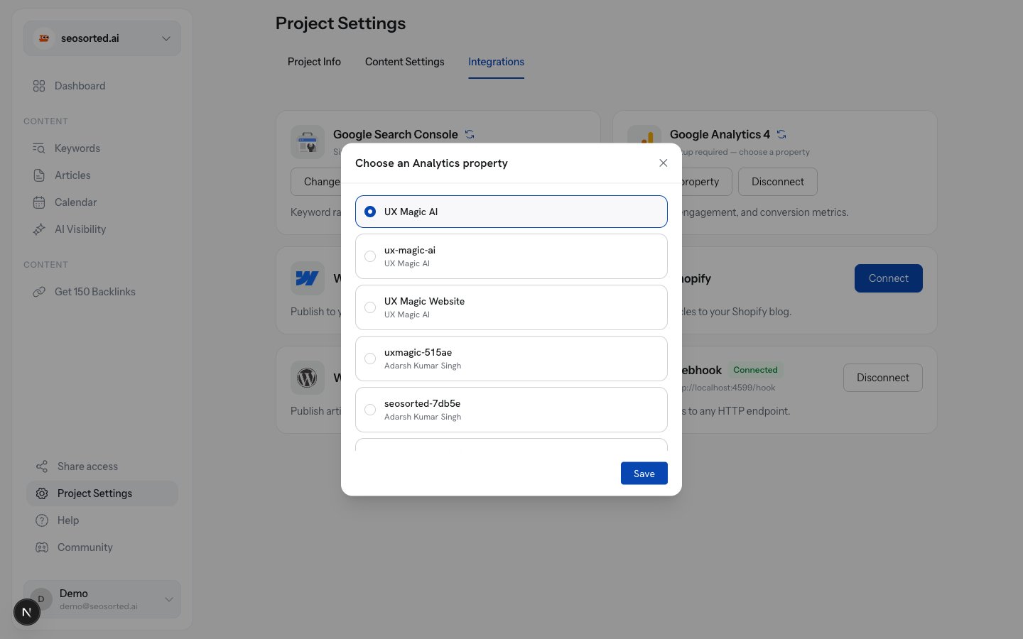 Choose an Analytics property dialog opened from the Integrations tab