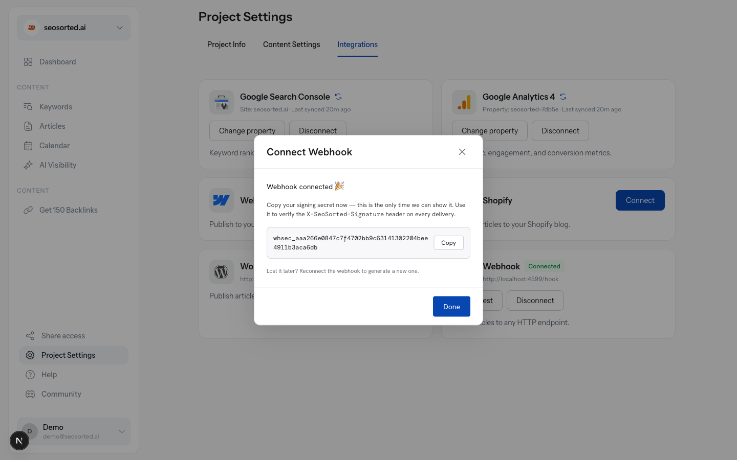 Webhook connected panel showing the generated whsec_ signing secret with a Copy button
