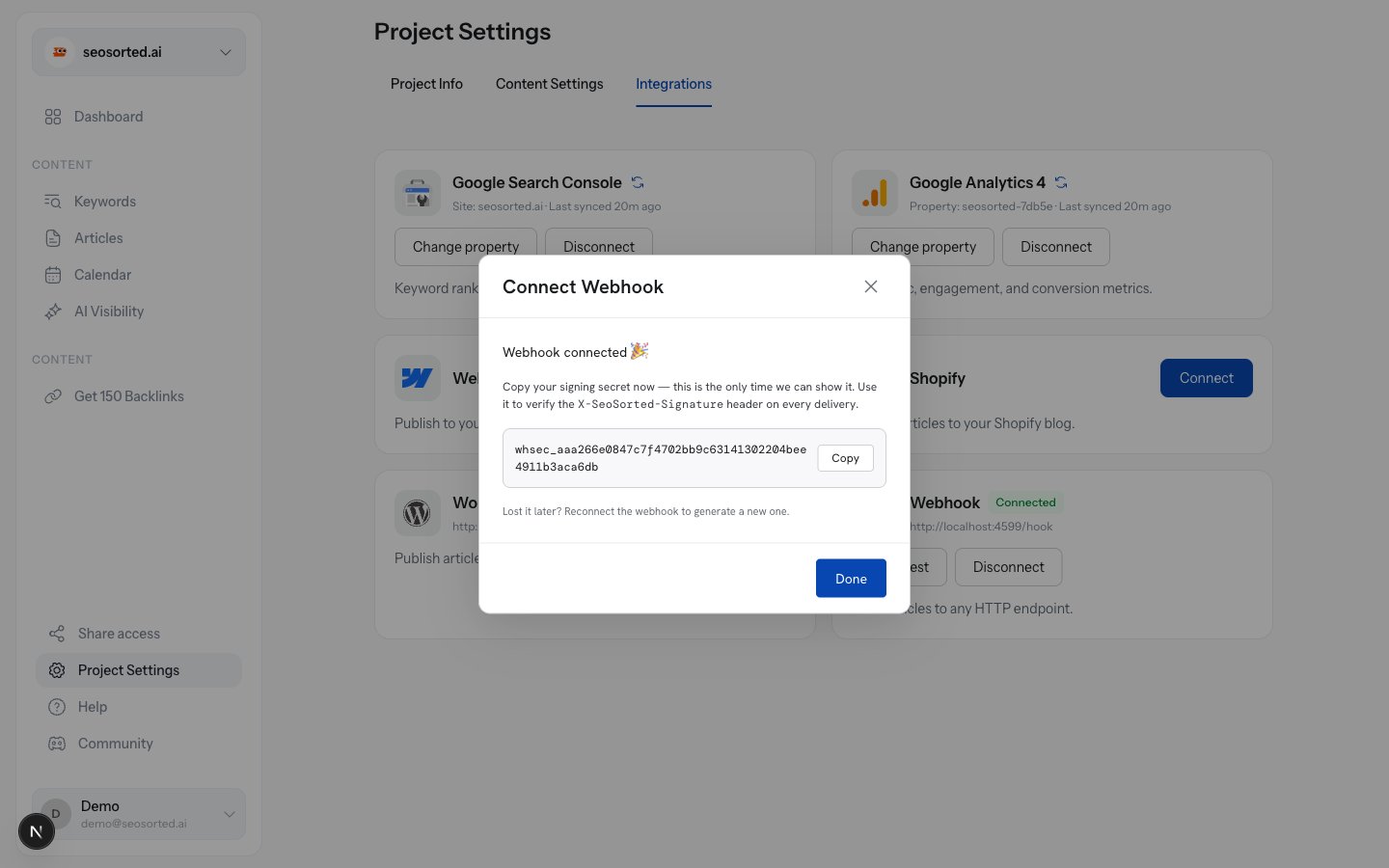 Webhook connected panel showing the generated whsec_ signing secret with a Copy button