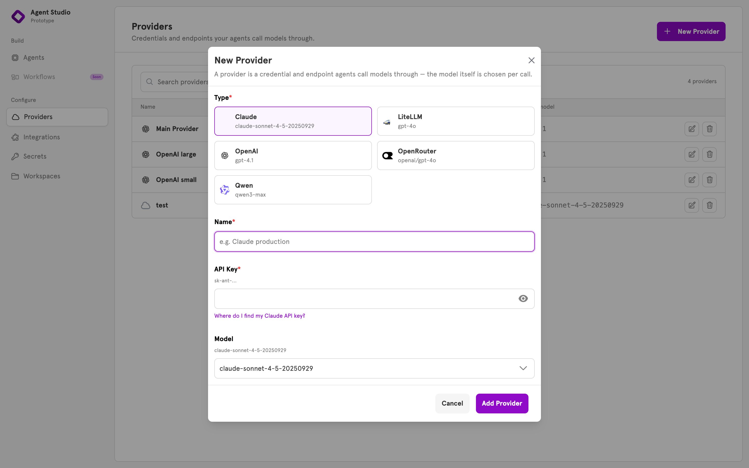 The New Provider dialog with five type cards: Claude, LiteLLM, OpenAI, OpenRouter, and Qwen