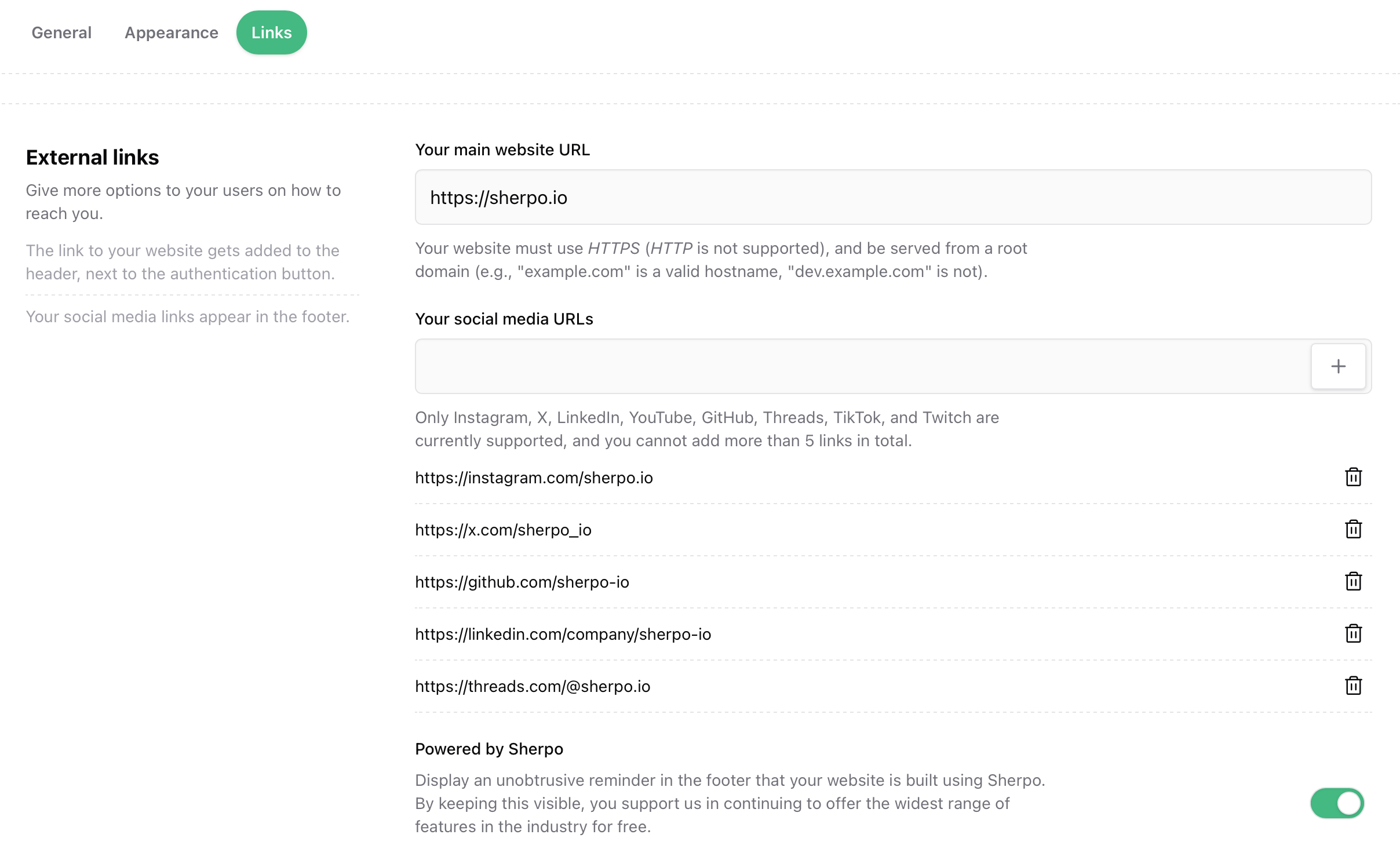 External links and footer Links tab with main website URL, social media links, and the Powered by Sherpo toggle