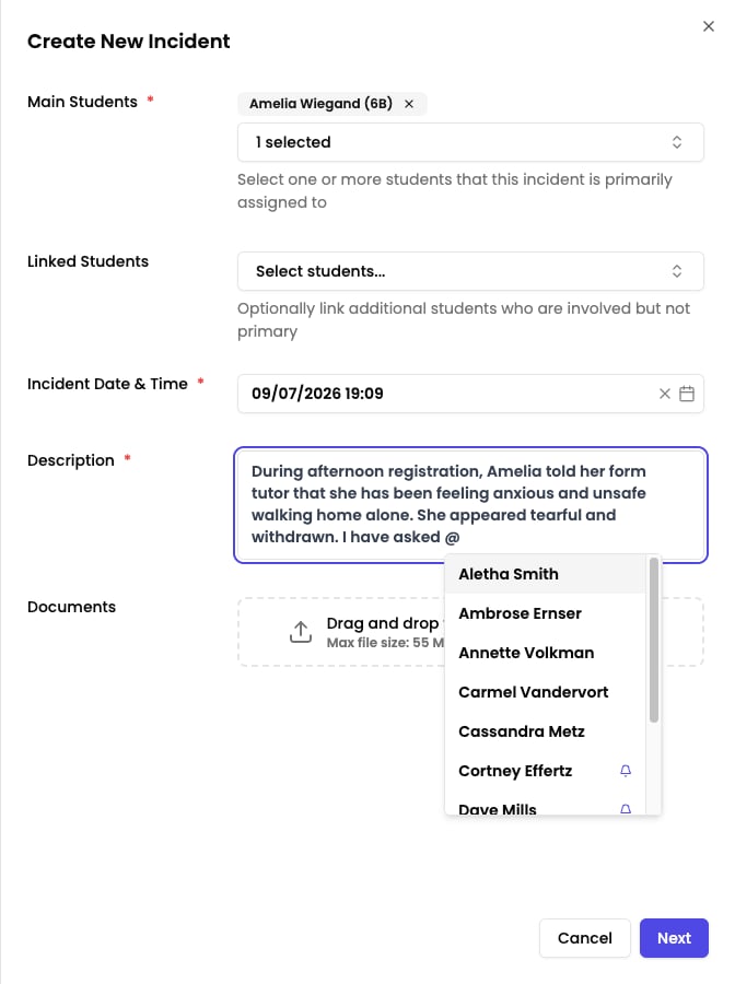 Incident description editor with the @mention dropdown listing colleagues to notify