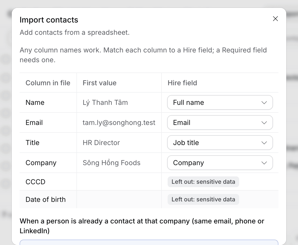 The column mapping for a contacts file, with CCCD and Date of birth marked Left out: sensitive data
