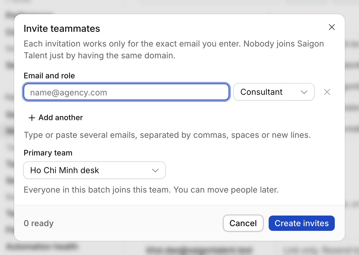 The Invite teammates dialog with an email field, a role picker and the primary team