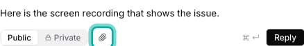 The comment reply box with the paperclip Attach files button highlighted