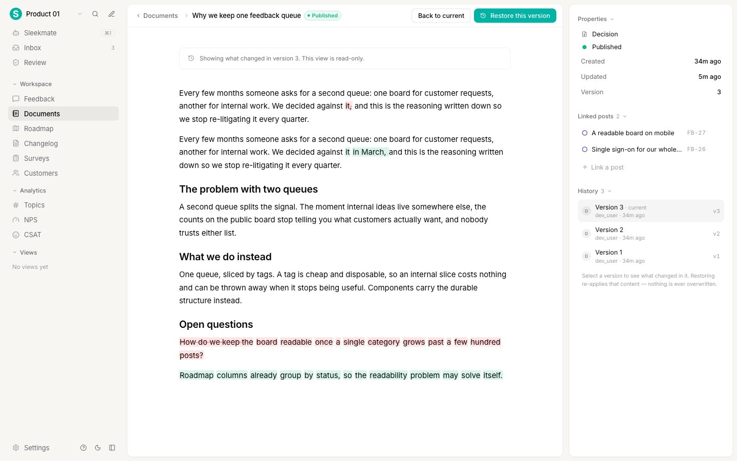 A document in diff mode with removed text struck through in red and added text highlighted in green