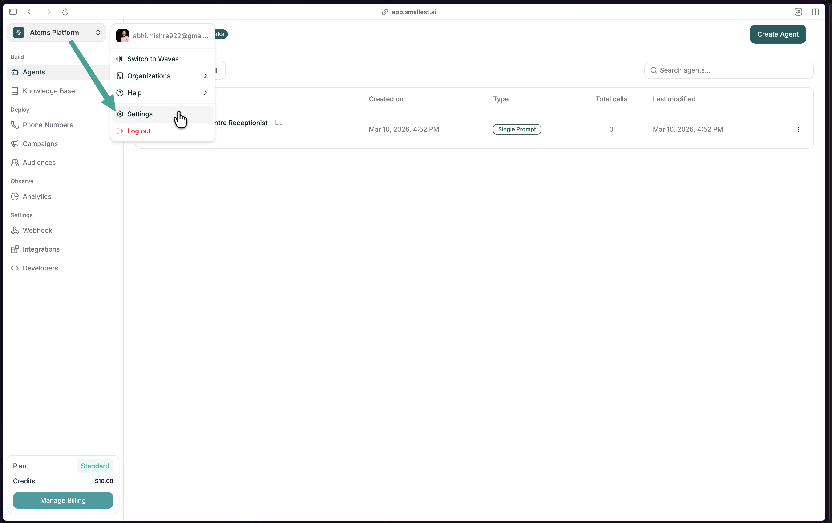 Atoms platform profile dropdown showing the Settings option