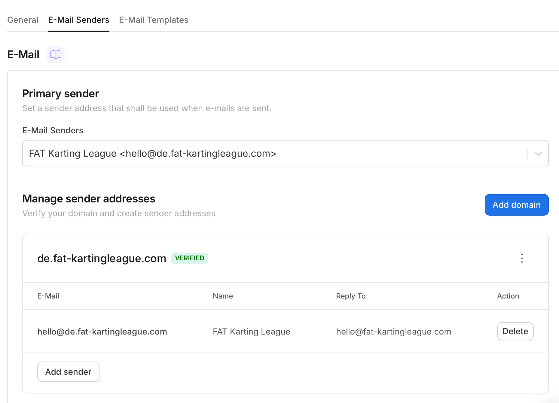 The E-Mail Senders page with the verified domain, sender, and primary sender set