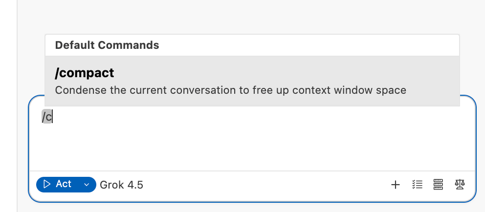 The default-command hint shown when typing /compact in the chat box: compact the current session to free up context space