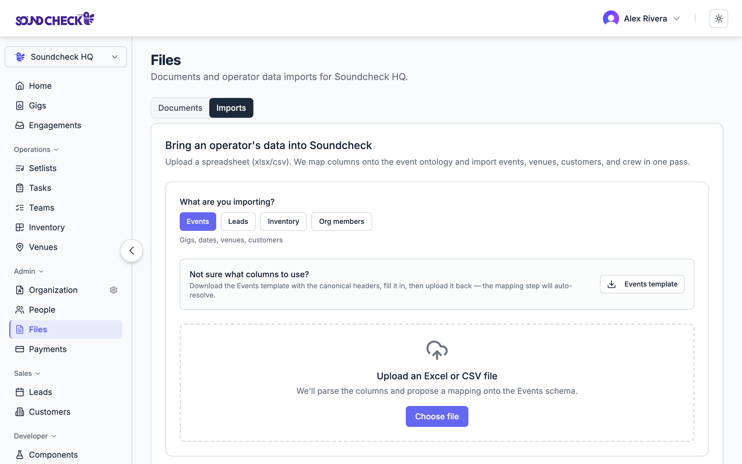 Import wizard with target type selection and file upload dropzone