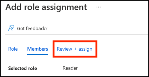 The role assignment workflow with the Review + Assign tab selected.