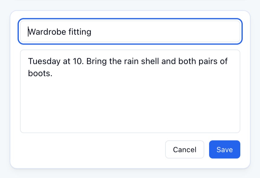 The Wardrobe fitting card open for editing, its title and text in fields with Cancel and Save under them