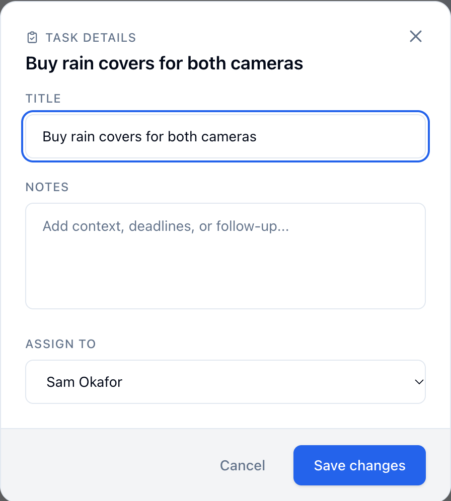 Task Details for Buy rain covers for both cameras, assigned to Sam Okafor