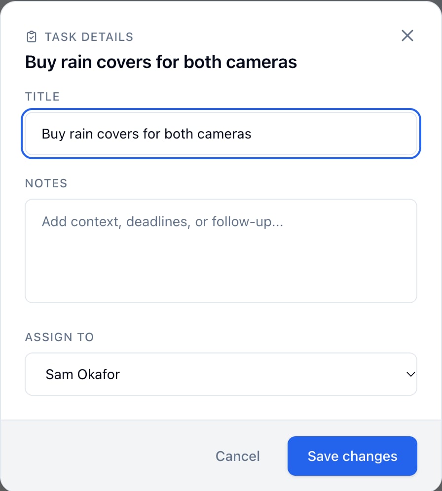Task Details for Buy rain covers for both cameras, assigned to Sam Okafor