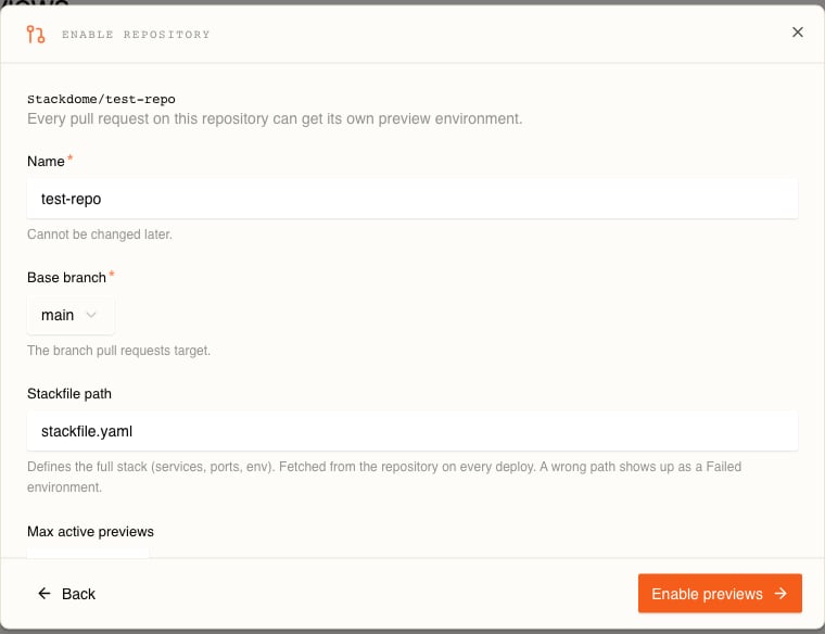 The Enable repository dialog in Stackdome, on its configuration step for Stackdome/test-repo, with a Name field reading test-repo and the hint Cannot be changed later, a Base branch dropdown set to main, a Stackfile path field reading stackfile.yaml, the label Max active previews at the fold with the rest of the form scrolled out of view, and Back and Enable previews buttons