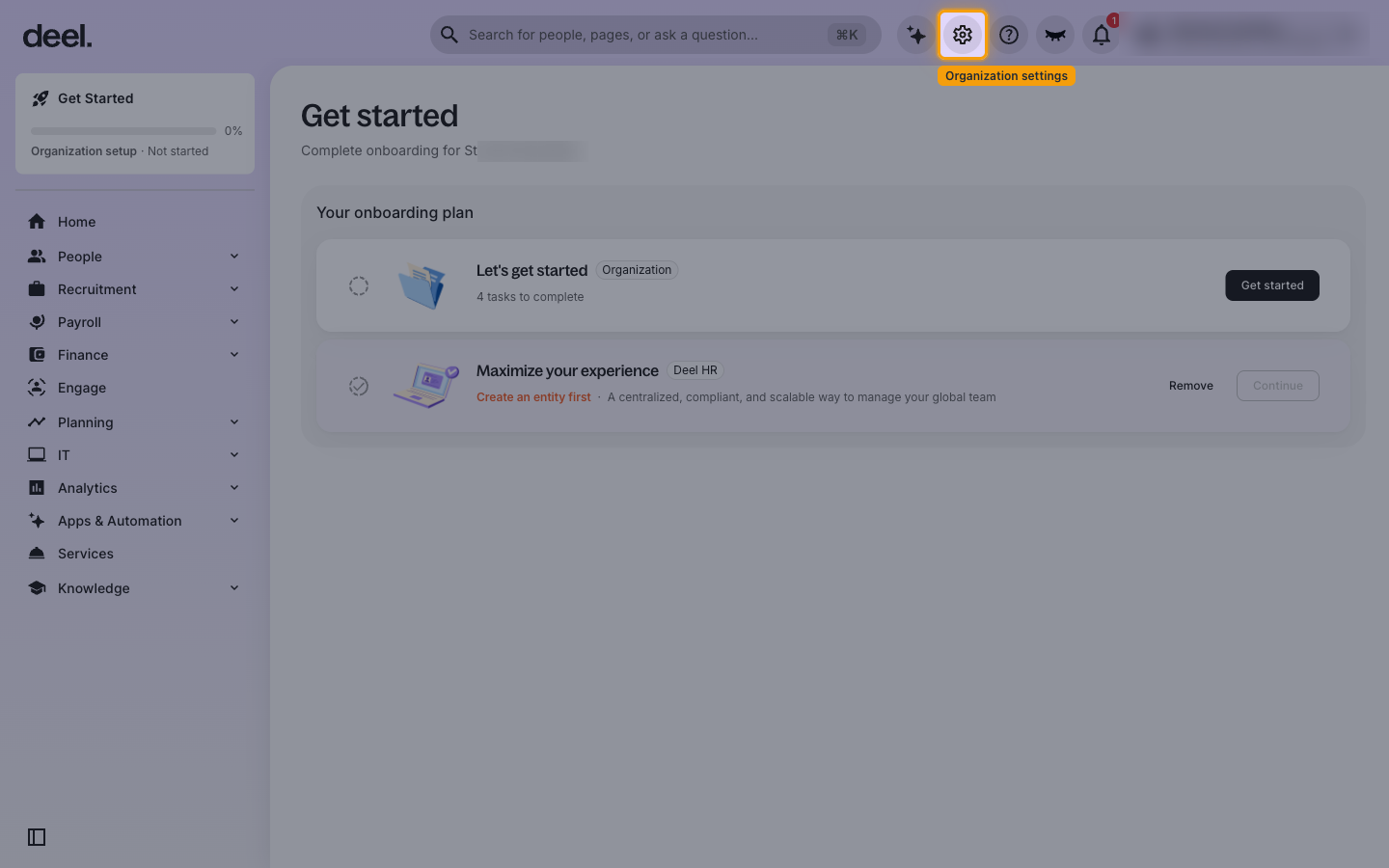 The Deel home page with the Organization settings gear icon in the top bar highlighted