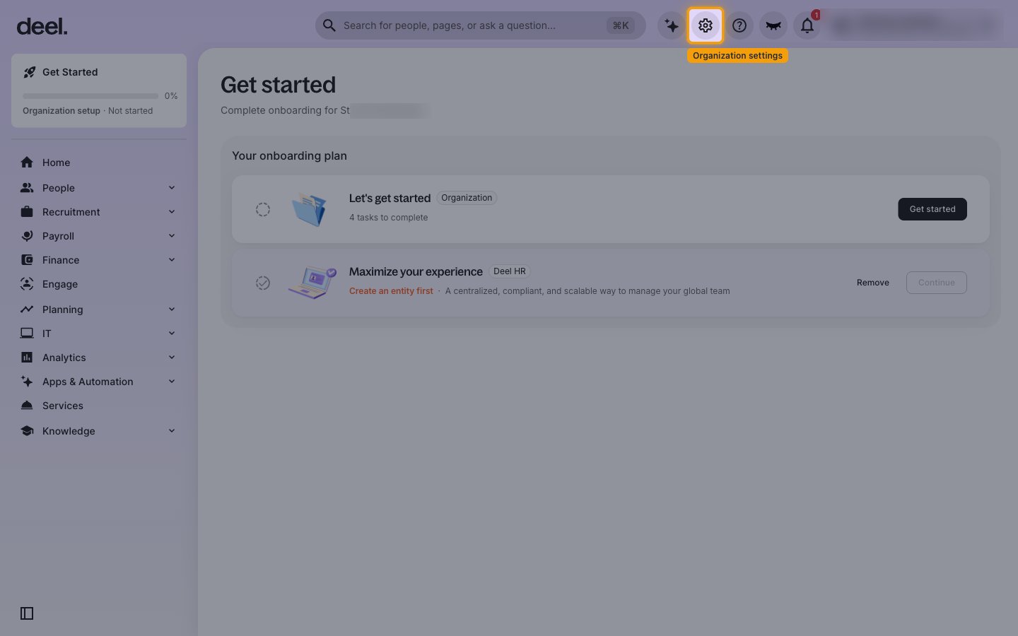 The Deel home page with the Organization settings gear icon in the top bar highlighted