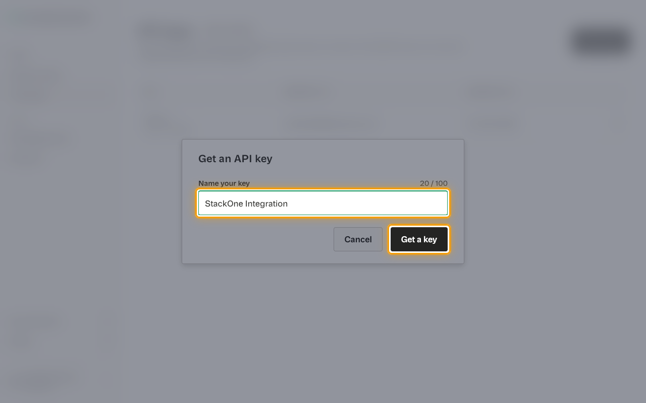 The Get an API key dialog with the Name your key field filled in and the Get a key button highlighted