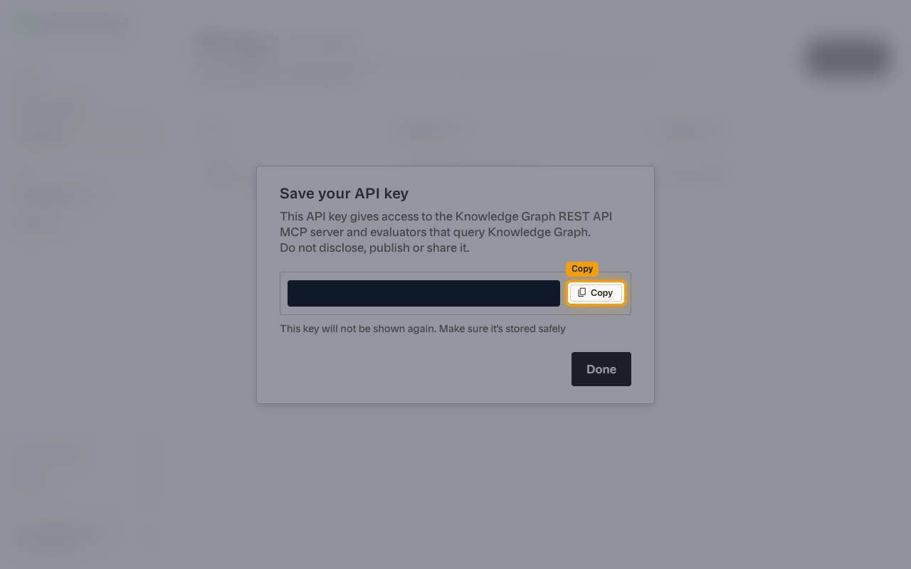 The Save your API key dialog with the key value hidden and the Copy button highlighted